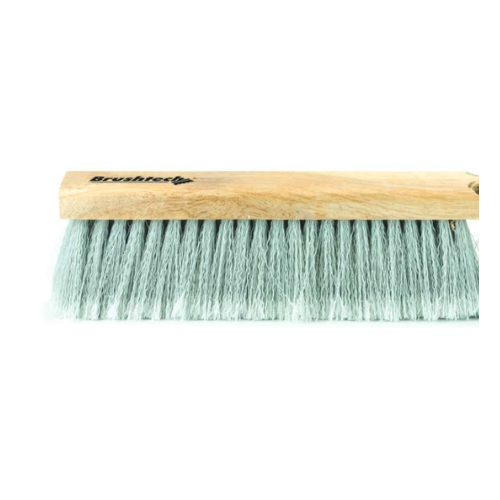 el-castor-cepillo-piso-pvc-14-pulgadas-delicado.jpg: Primer plano de las fibras cardadas de PVC del cepillo de El Castor, ideal para superficies delicadas